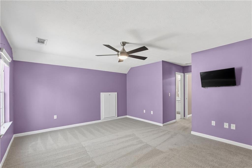 5976 Bowers Road Stone Mountain, GA 30087 - Photo 15 of 29 a view of livingroom with ceiling fan