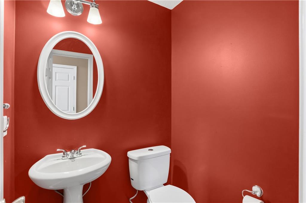 5976 Bowers Road Stone Mountain, GA 30087 - Photo 21 of 29 a bathroom with a toilet and a sink