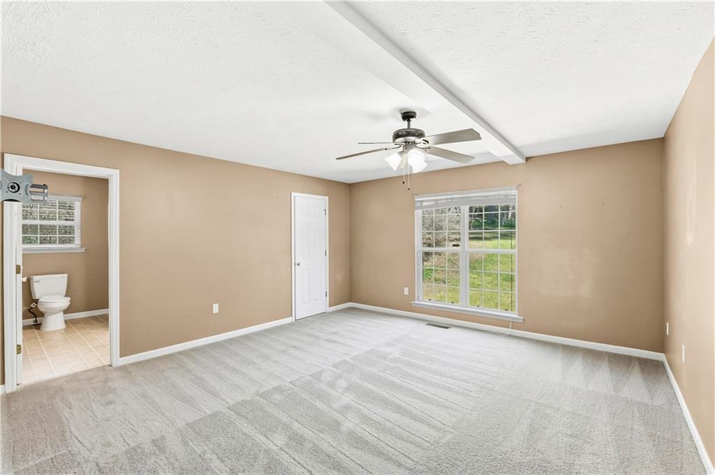 5976 Bowers Road Stone Mountain, GA 30087 - Photo 22 of 29 a view of an empty room with a window