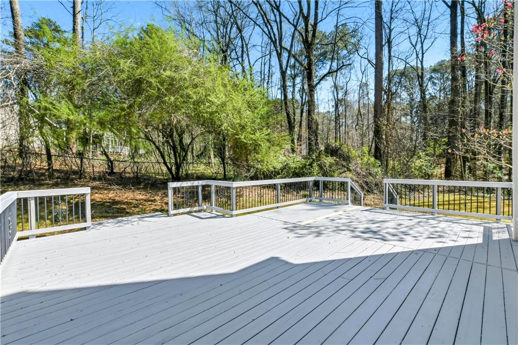 5976 Bowers Road Stone Mountain, GA 30087 - Photo 27 of 29 a view of a house with a deck