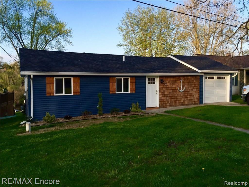 7252 Clement Road Clarkston, MI 48346 - Photo 1 of 25 Welcome to 7252 Clement! Located on All Sports Green Lake! Move right in! Everything is done and ready for summer FUN!