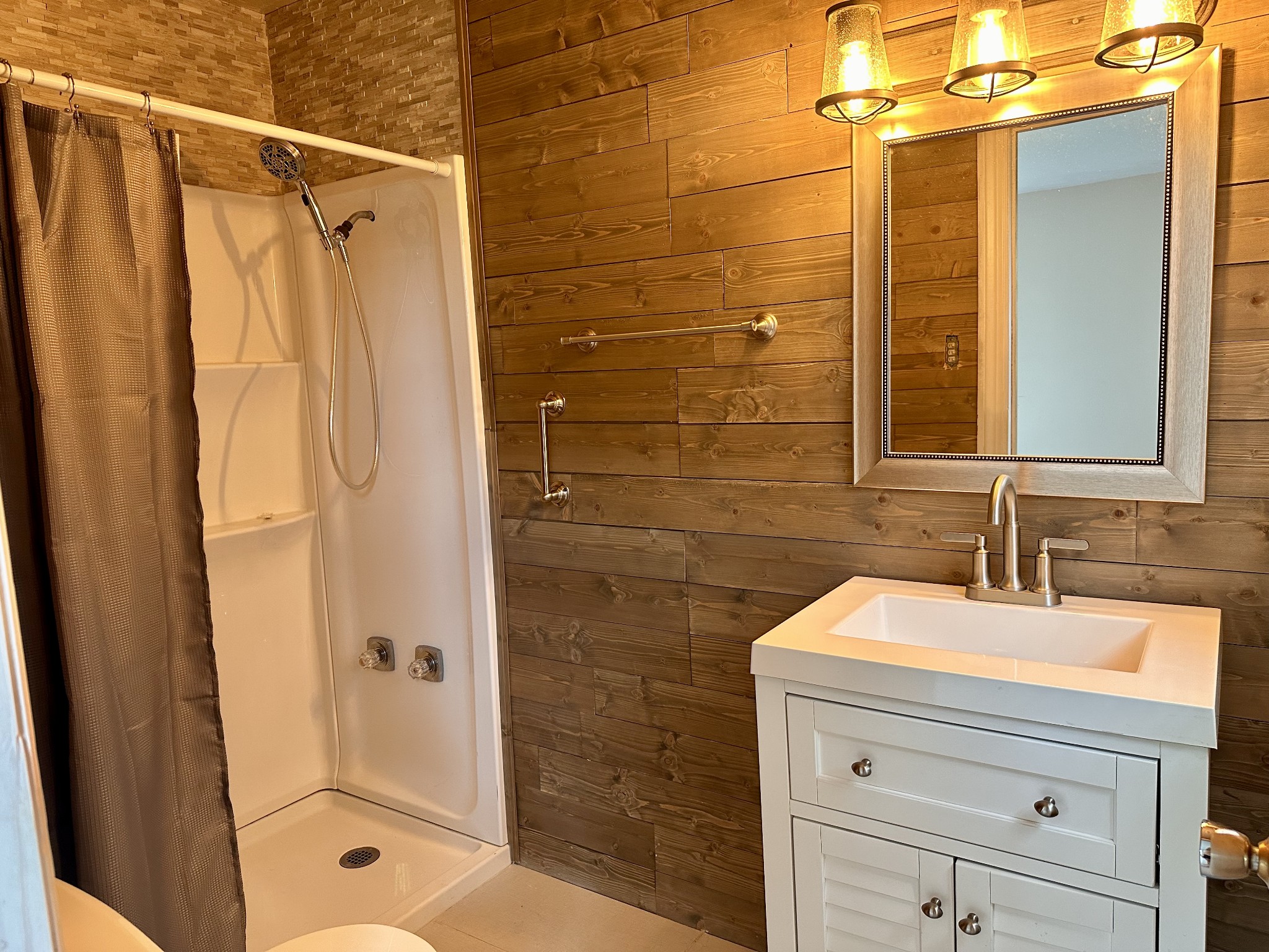 912 Hills Chapel Road Manchester, TN 37355 - Photo 13 of 23 a bathroom with a shower and a sink