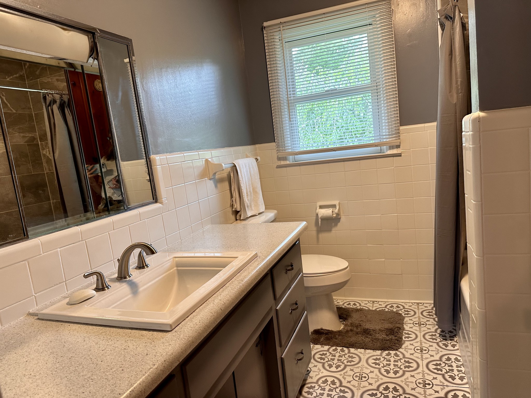 912 Hills Chapel Road Manchester, TN 37355 - Photo 14 of 23 a bathroom with a sink toilet and shower