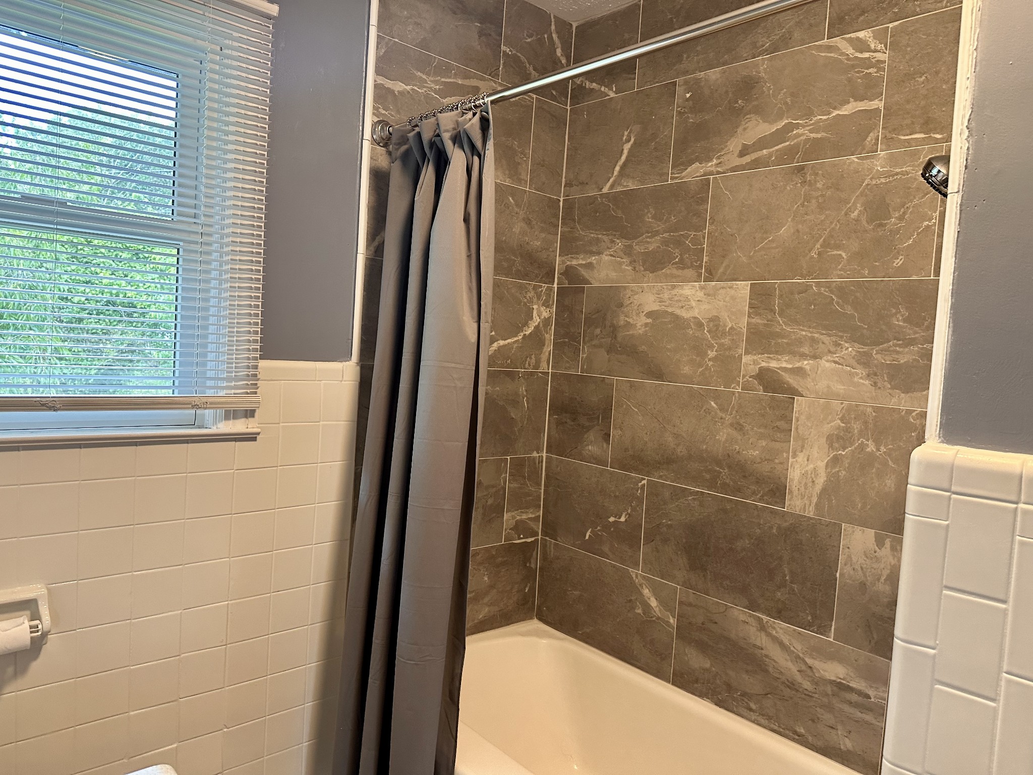 912 Hills Chapel Road Manchester, TN 37355 - Photo 15 of 23 a bathroom with a shower and a sink