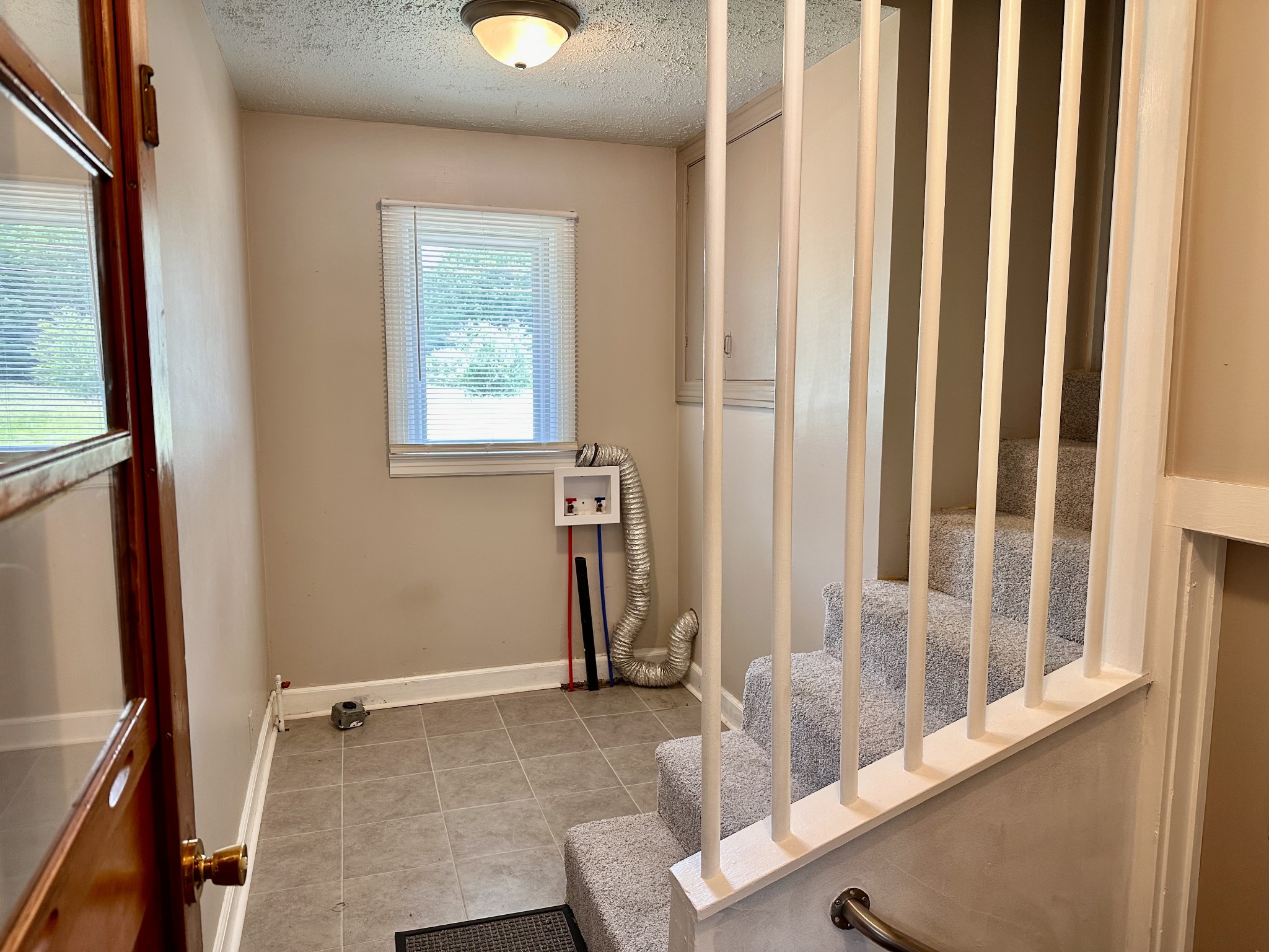 912 Hills Chapel Road Manchester, TN 37355 - Photo 19 of 23 a view of an empty room with a window