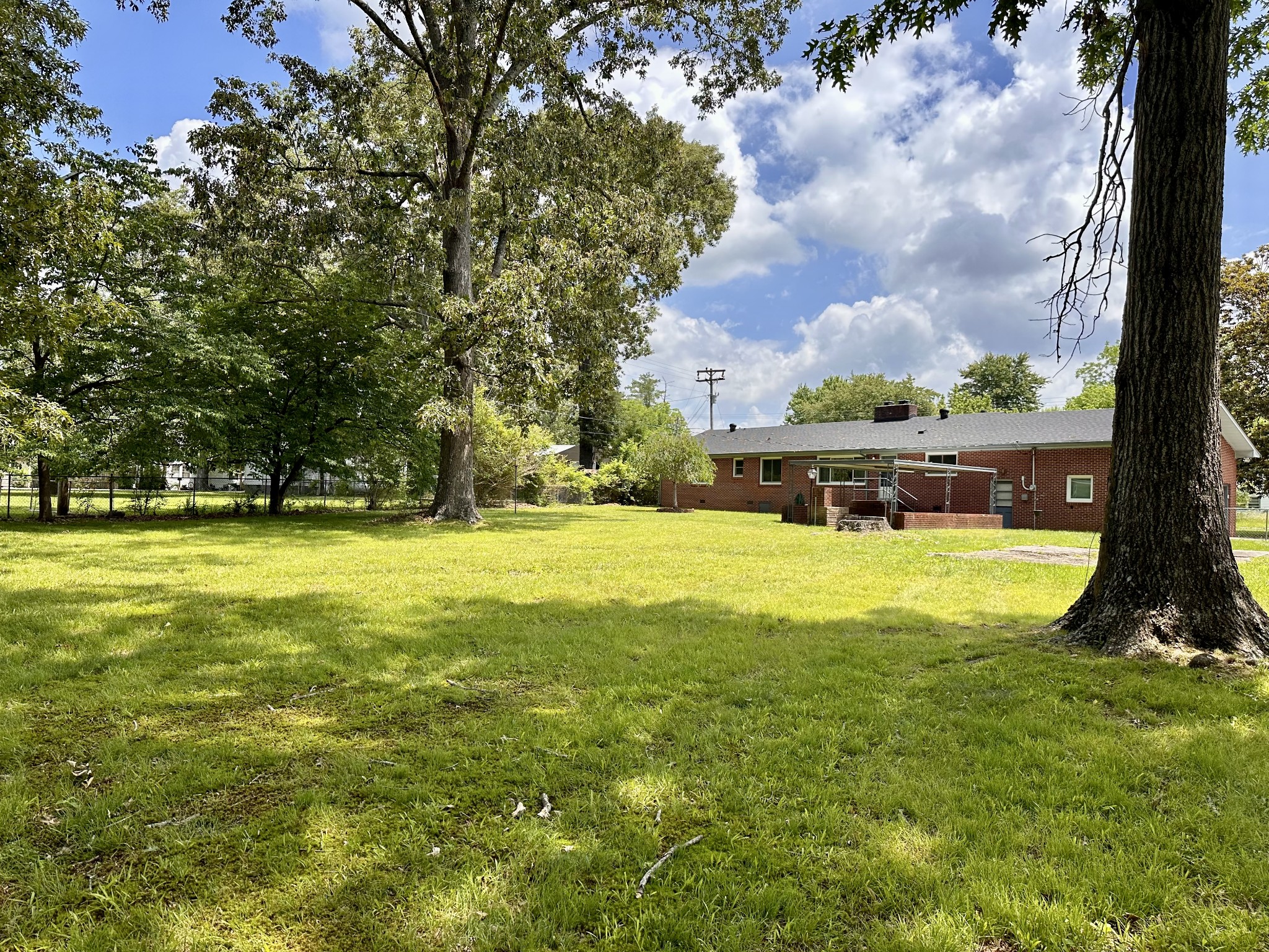 912 Hills Chapel Road Manchester, TN 37355 - Photo 22 of 23 a view of yard with swimming pool and green space