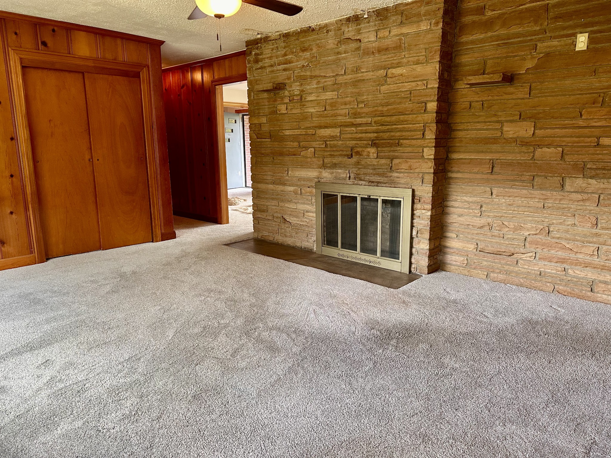 912 Hills Chapel Road Manchester, TN 37355 - Photo 10 of 23 a view of an empty room with a fireplace