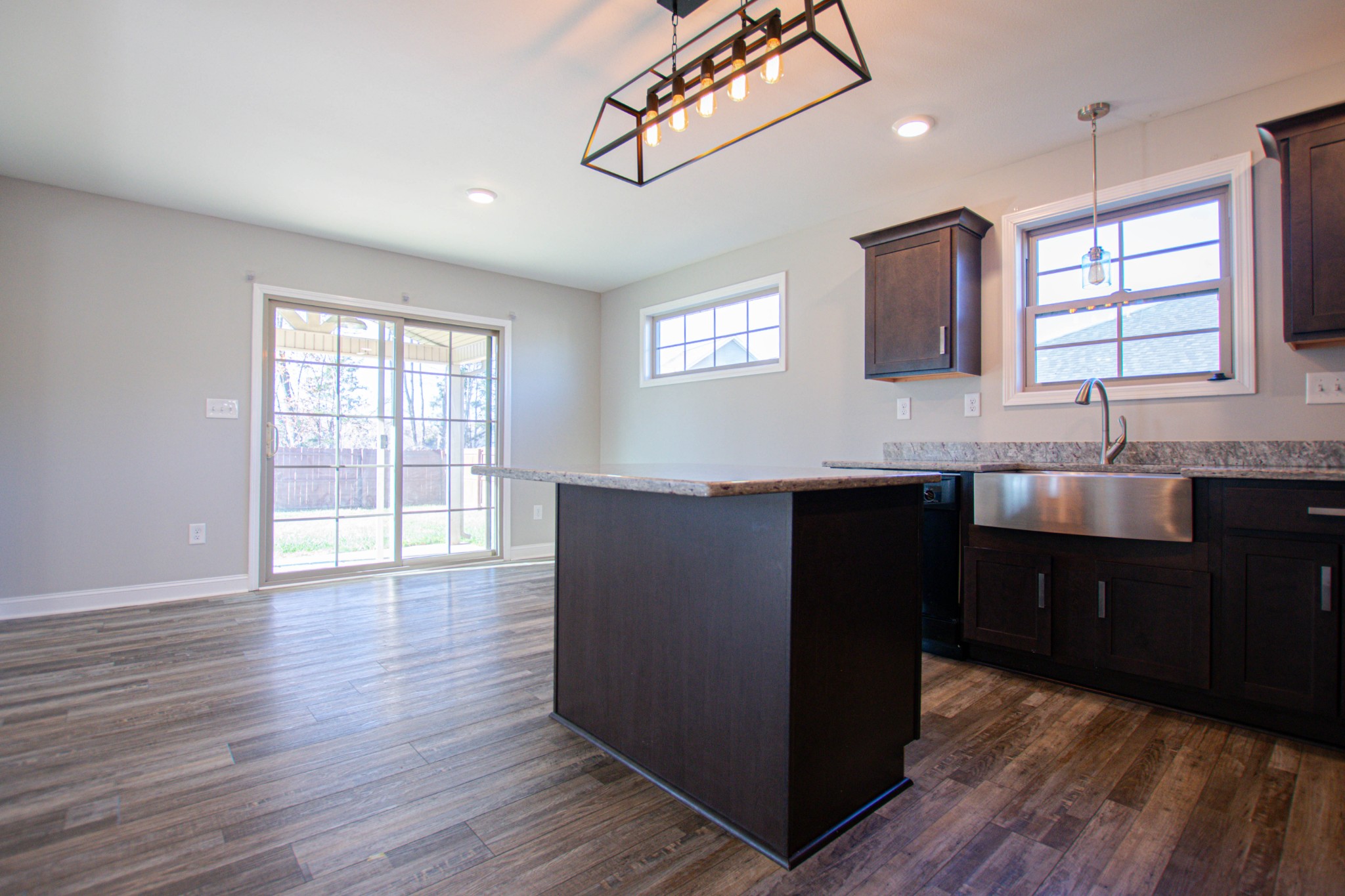 104 Schroer Road Clarksville, TN 37042 - Photo 11 of 25 a kitchen with a sink a counter space and wooden floor