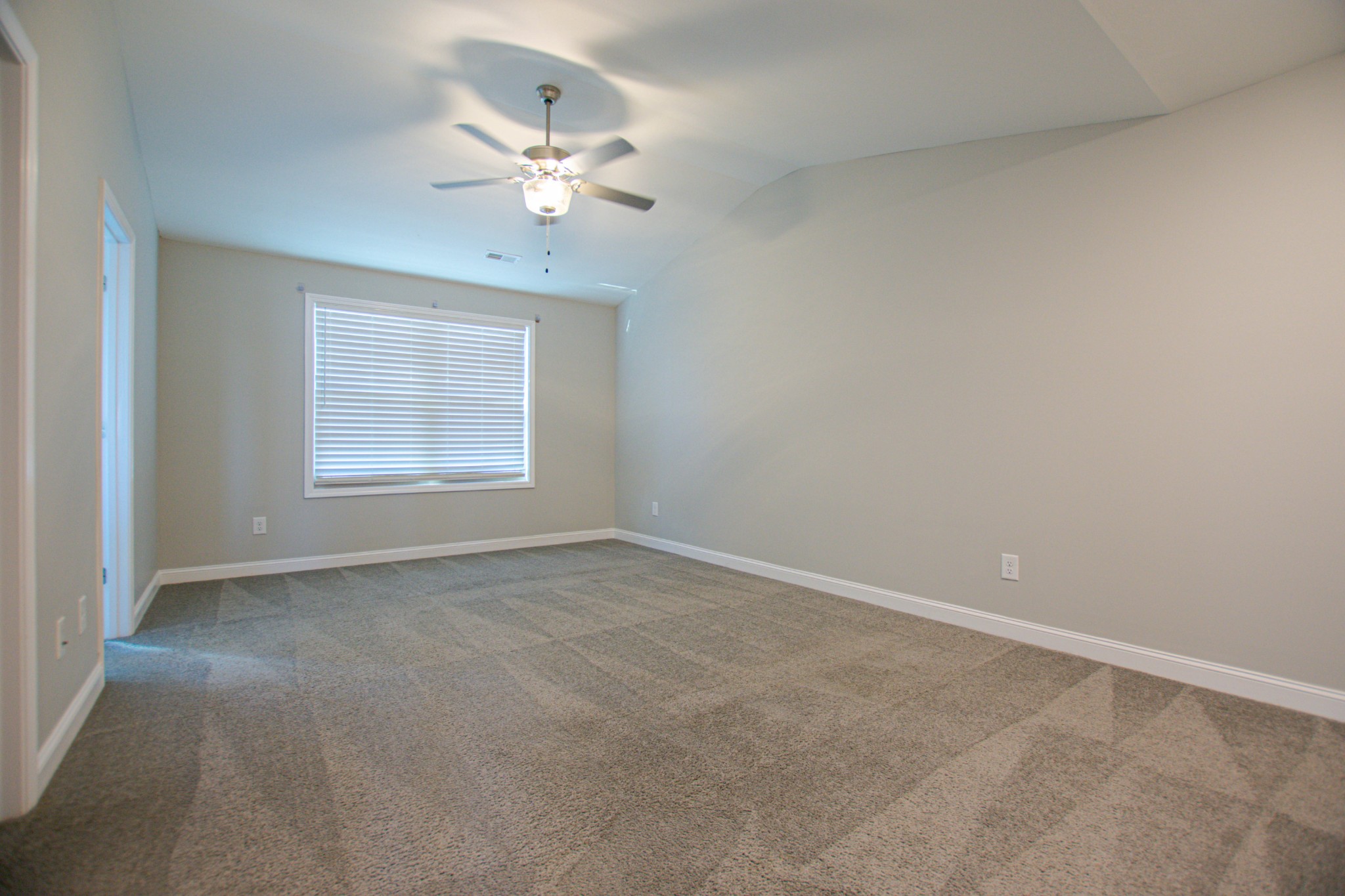 104 Schroer Road Clarksville, TN 37042 - Photo 14 of 25 a view of an empty room with a chandelier fan
