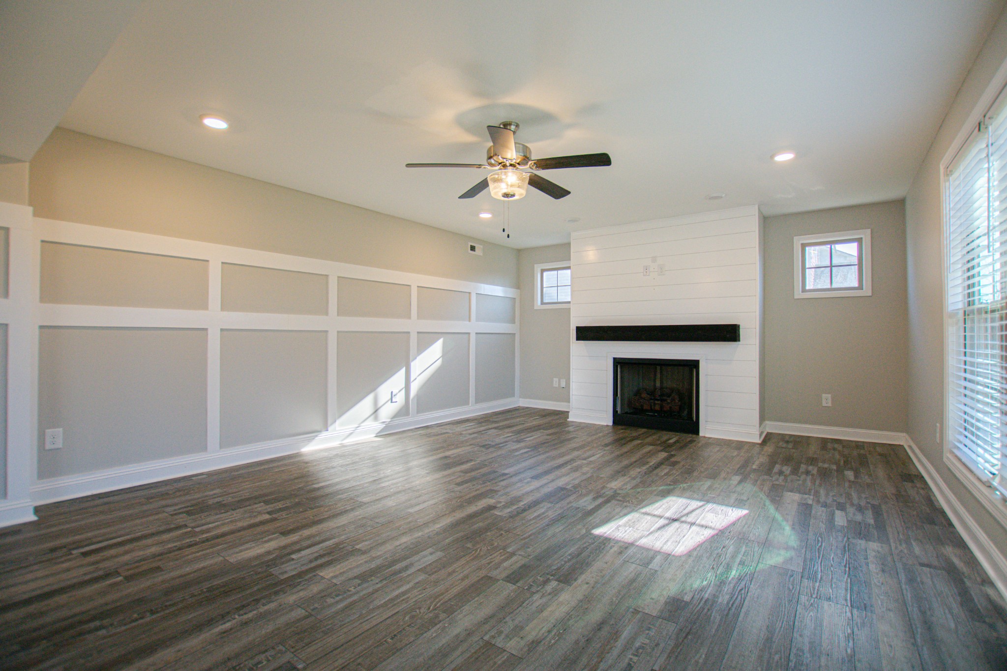 104 Schroer Road Clarksville, TN 37042 - Photo 3 of 25 a view of an empty room with wooden floor fireplace and a window