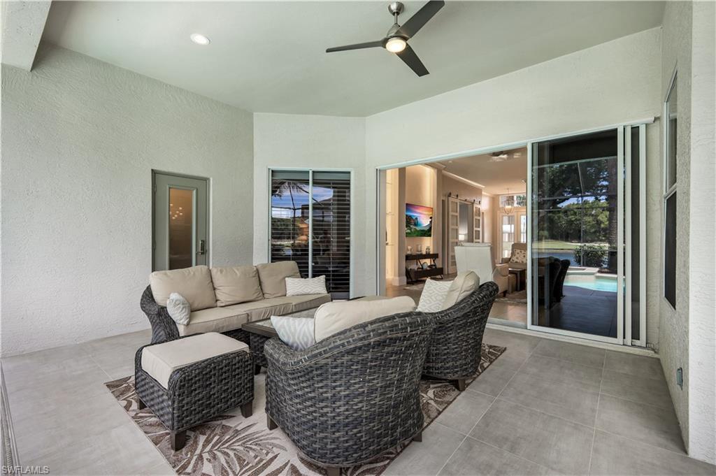 17945 Modena Road Miromar Lakes, FL 33913 - Photo 19 of 24 a living room with furniture