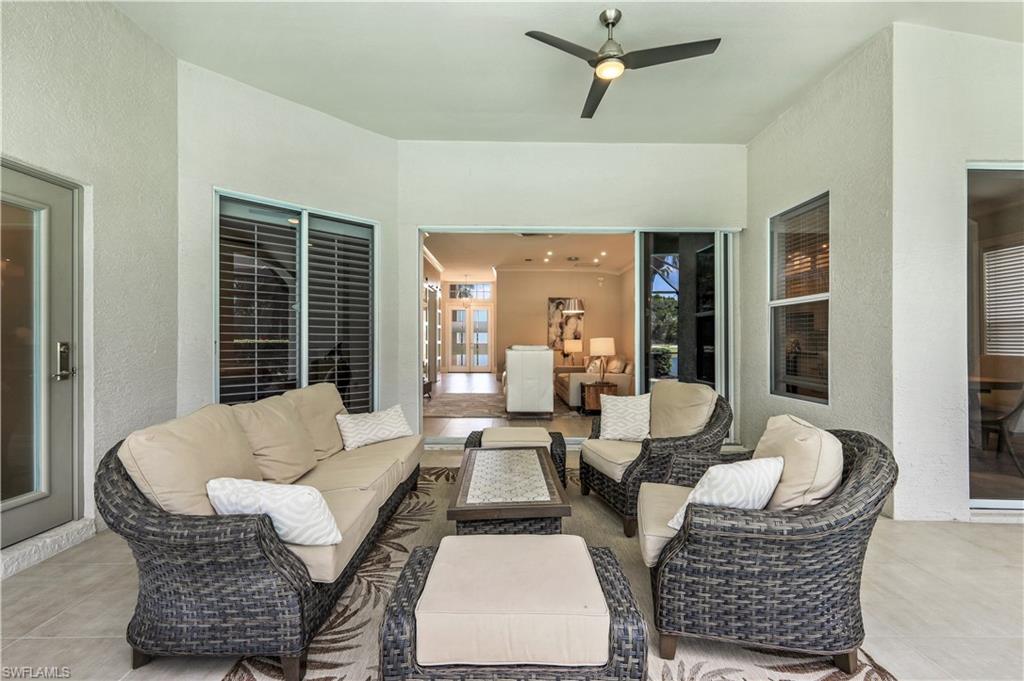 17945 Modena Road Miromar Lakes, FL 33913 - Photo 20 of 24 a living room with furniture