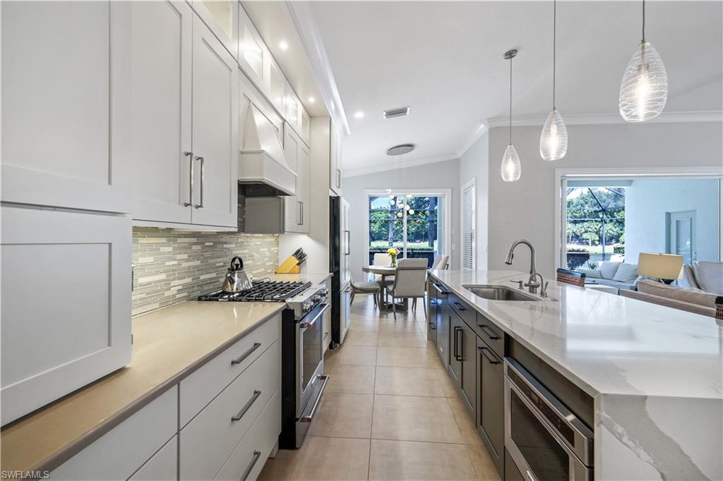 17945 Modena Road Miromar Lakes, FL 33913 - Photo 8 of 24 a kitchen with lots of counter top space