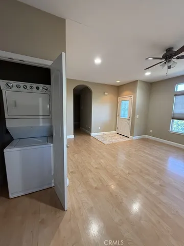 a view of hallway with washer and dryer
