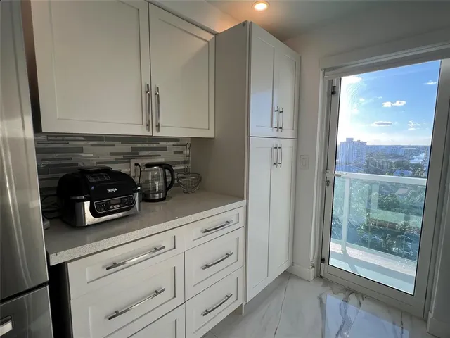 a view of a balcony with an ocean view