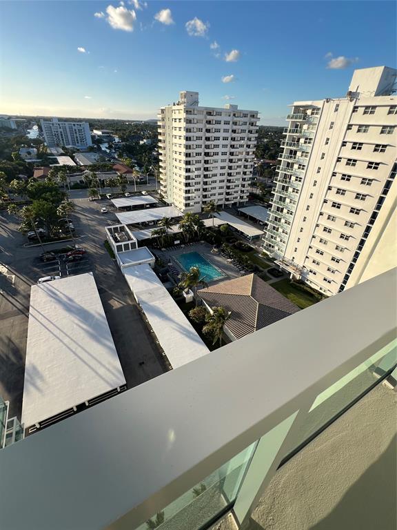 1610 North Ocean Boulevard, Unit 1202 Pompano Beach, FL 33062 - Photo 22 of 31 a view of a balcony with an ocean view