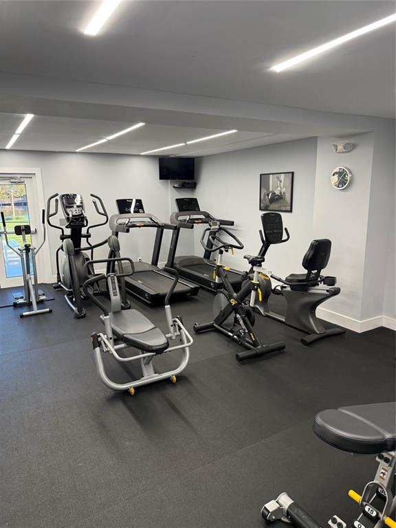 1610 North Ocean Boulevard, Unit 1202 Pompano Beach, FL 33062 - Photo 27 of 31 a view of a room with gym equipment