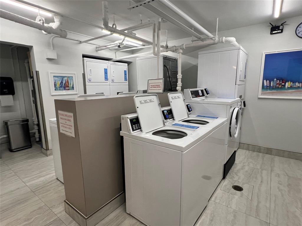 1610 North Ocean Boulevard, Unit 1202 Pompano Beach, FL 33062 - Photo 30 of 31 a utility room with dryer and washer