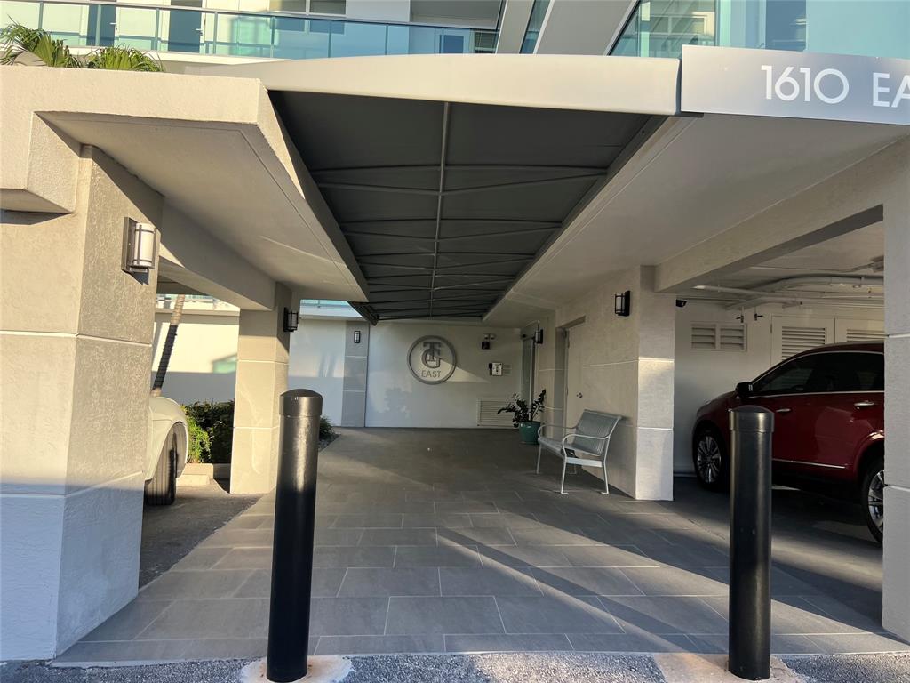 1610 North Ocean Boulevard, Unit 1202 Pompano Beach, FL 33062 - Photo 31 of 31 a view of a porch with furniture