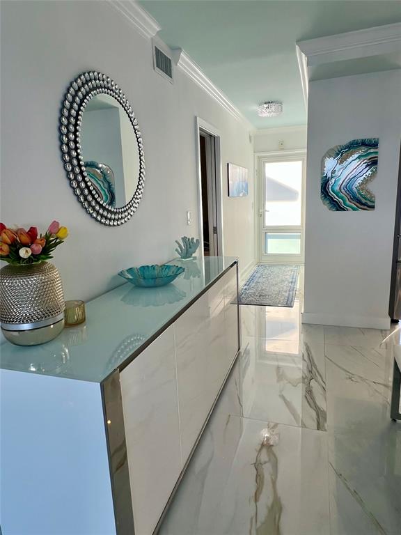 1610 North Ocean Boulevard, Unit 1202 Pompano Beach, FL 33062 - Photo 7 of 31 a bathroom with a sink and a mirror