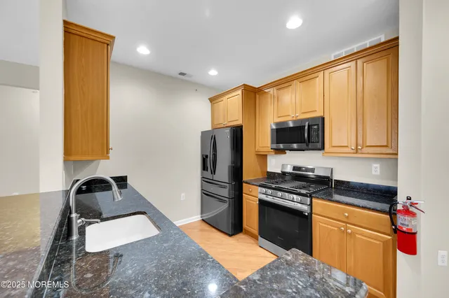 a view of a livingroom with a ceiling fan