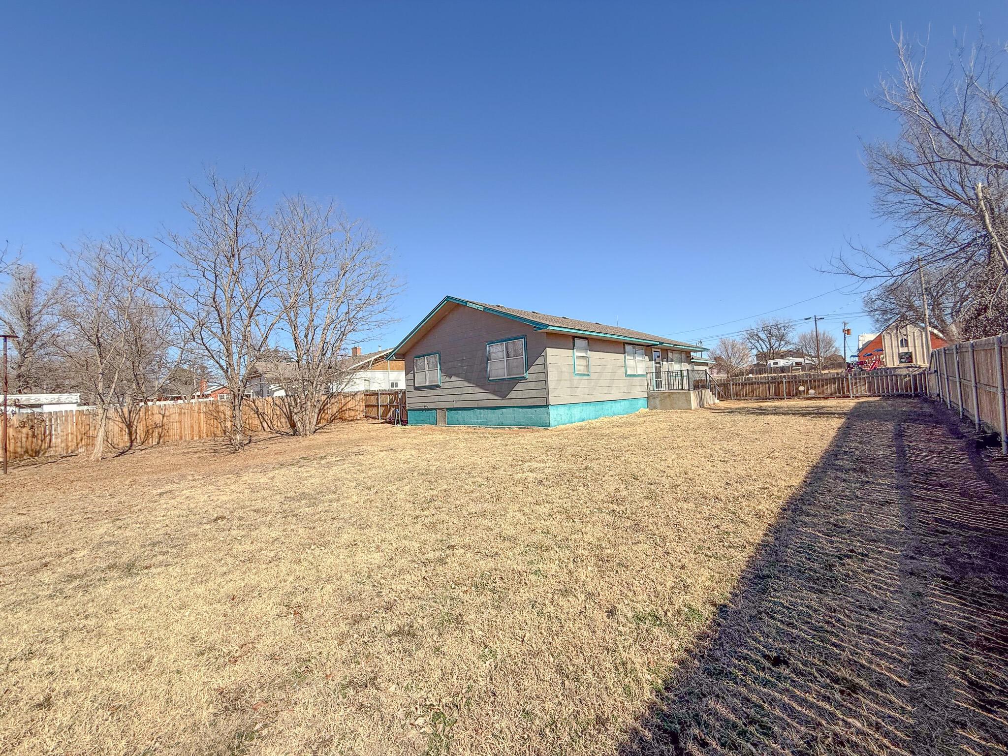702 South Canadian Street Wheeler, TX 79096 - Photo 41 of 47 a view of big yard with large trees