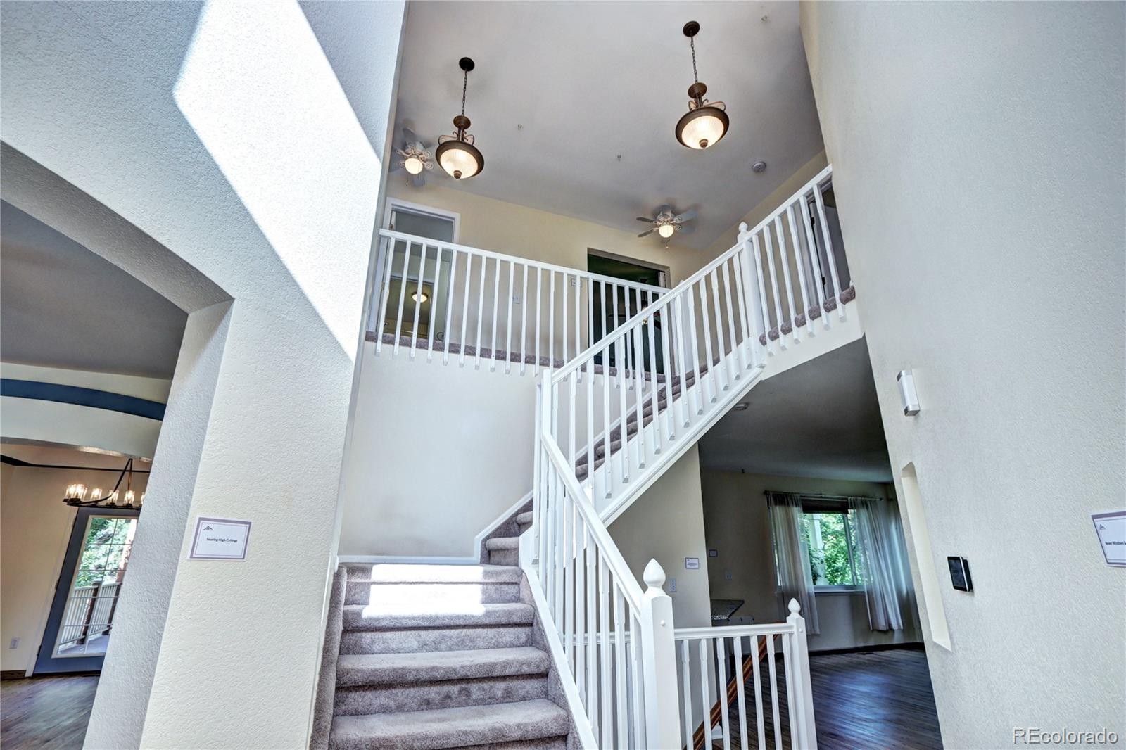 1313 Iris Circle Broomfield, CO 80020 - Photo 3 of 41 a view of entryway and hall with wooden floor