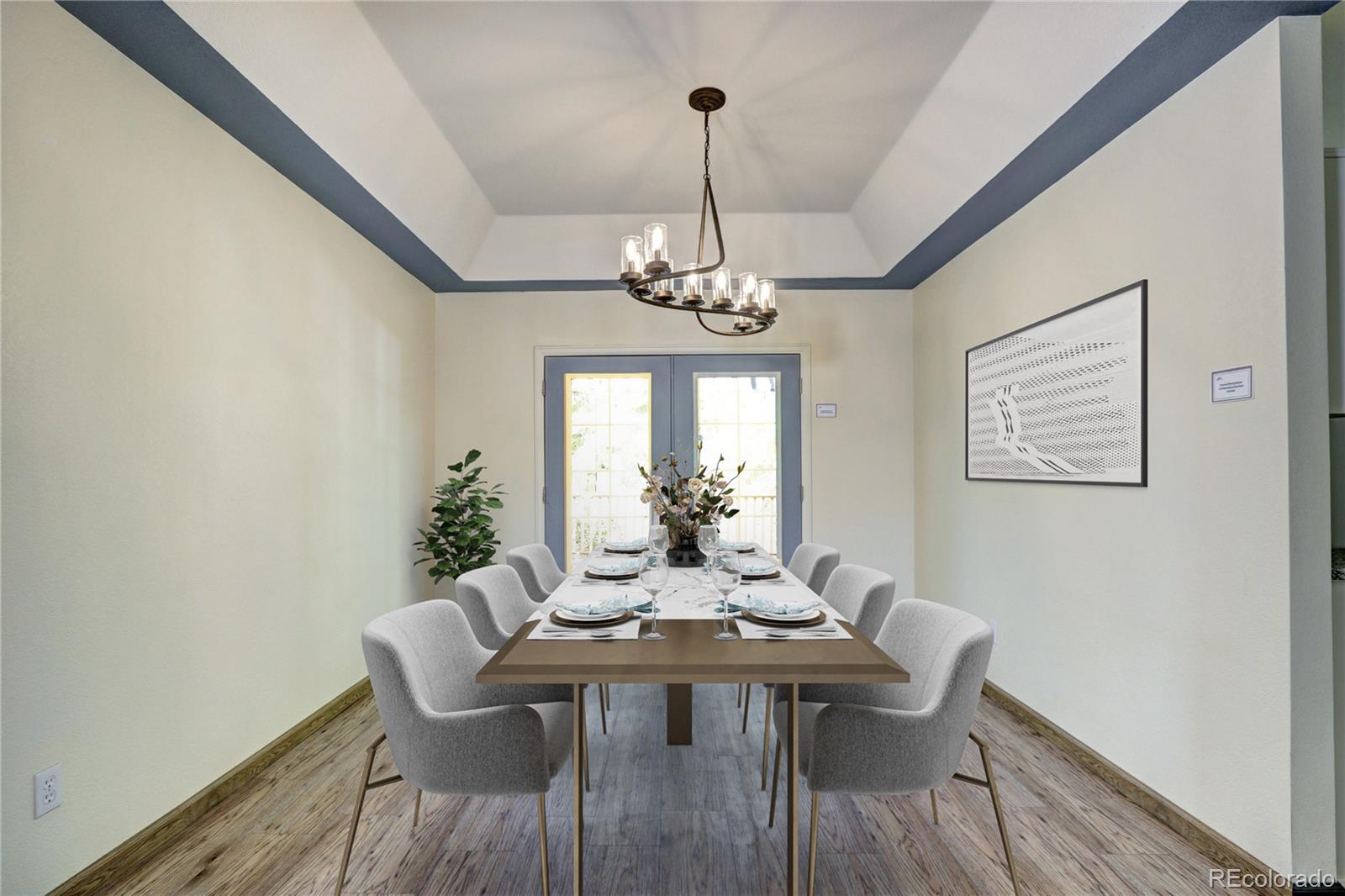 1313 Iris Circle Broomfield, CO 80020 - Photo 8 of 41 a view of a dining room with furniture window and wooden floor