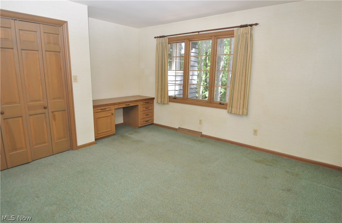 2250 Lancaster Road Akron, OH 44313 - Photo 25 of 35 Bedroom #5 has a built-in desk and walk-in closet.