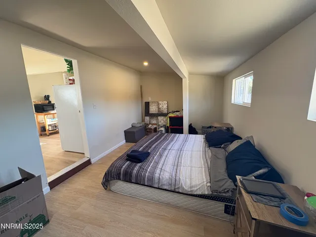 a bathroom with a shower toilet and sink