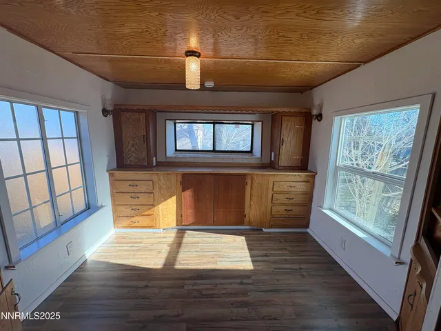 a room with window and wooden floor