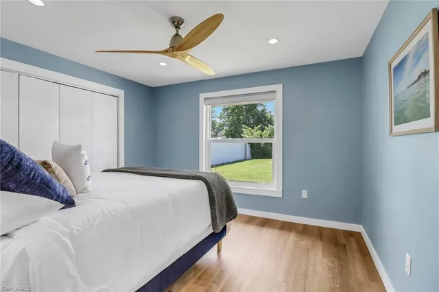 a bathroom with a sink vanity granite and toilet
