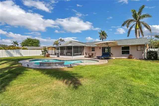 a view of a house with a swimming pool