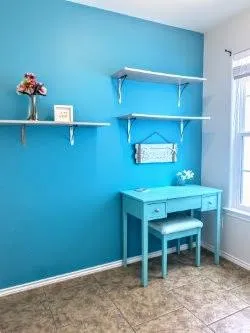 a room with cabinets and wooden floor