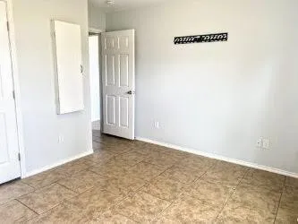 a view of a room with an empty space