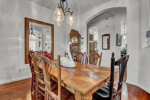 a living room with furniture fireplace and flat screen tv