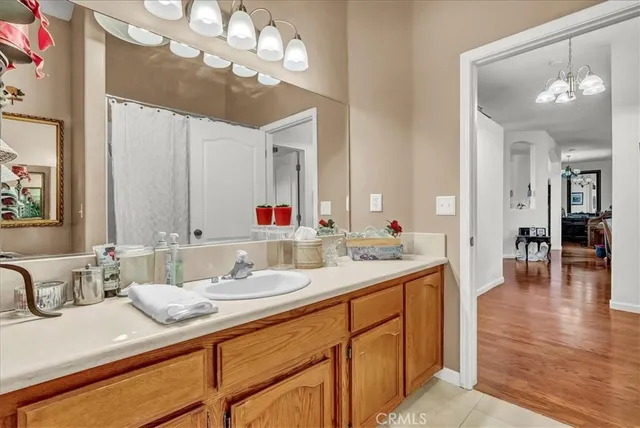 a bedroom with a bed and dresser