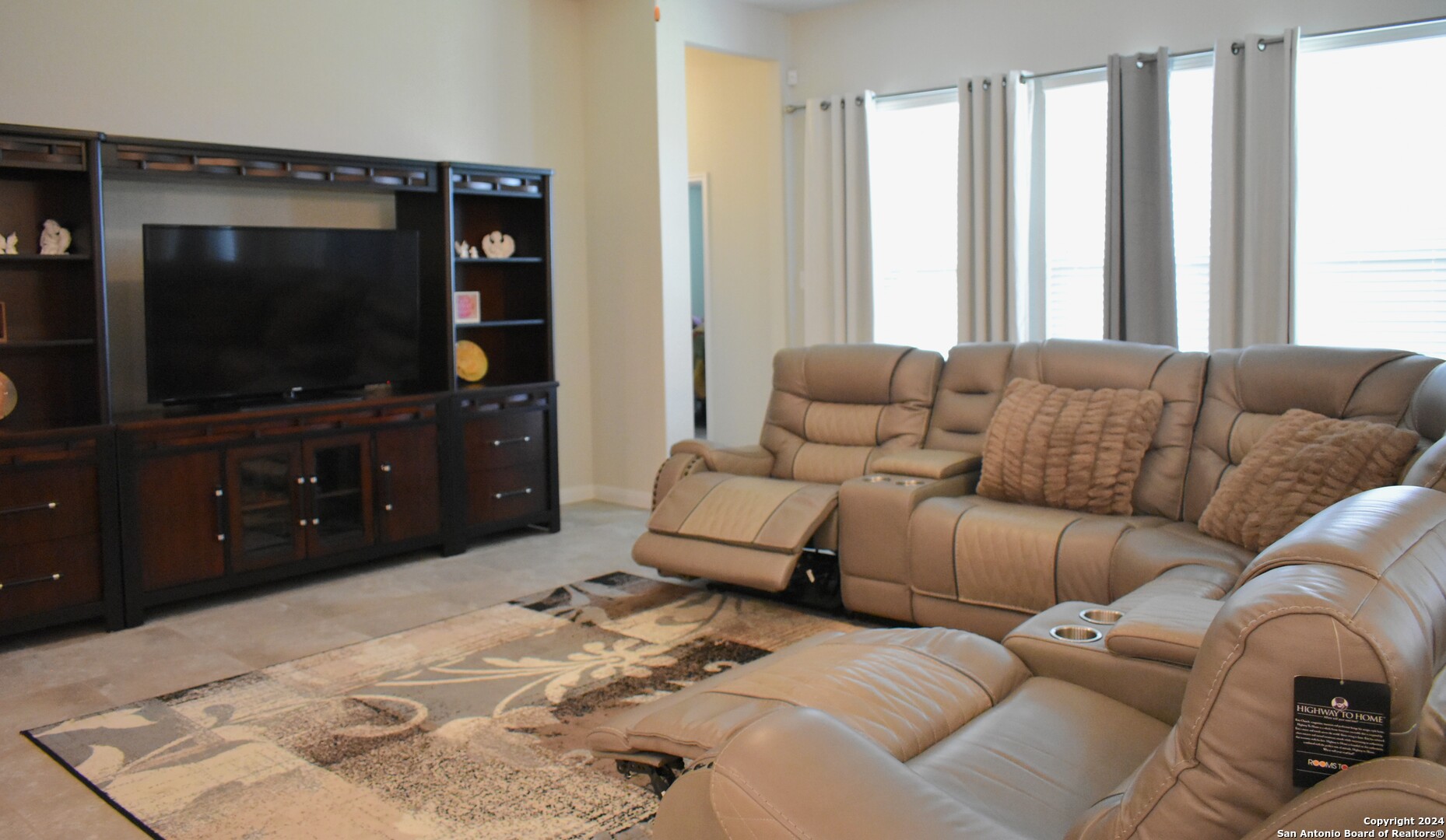 624 Colt Trail Schertz, TX 78154 - Photo 5 of 20 a living room with furniture and a flat screen tv