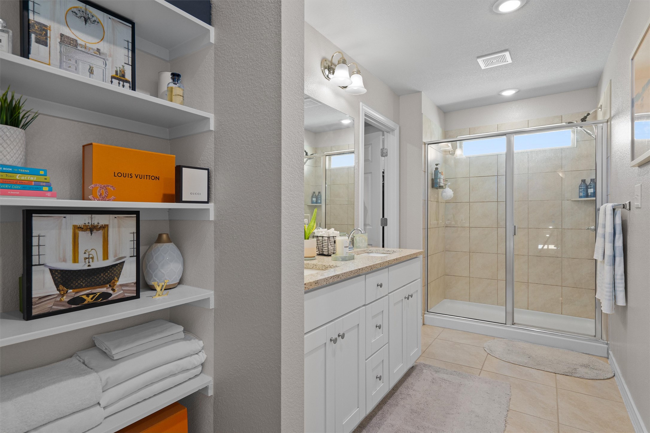 Undisclosed Address Buda, TX 78610 - Photo 24 of 39 a bathroom with a granite countertop sink mirror and shower