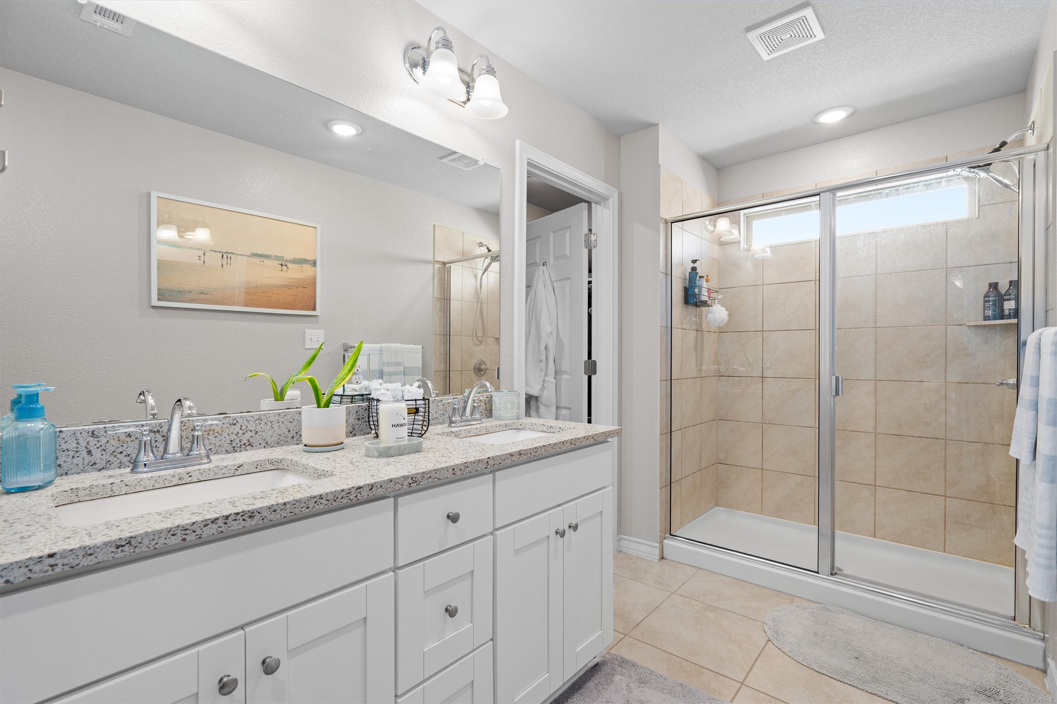 Undisclosed Address Buda, TX 78610 - Photo 25 of 39 a bathroom with a granite countertop sink mirror and double