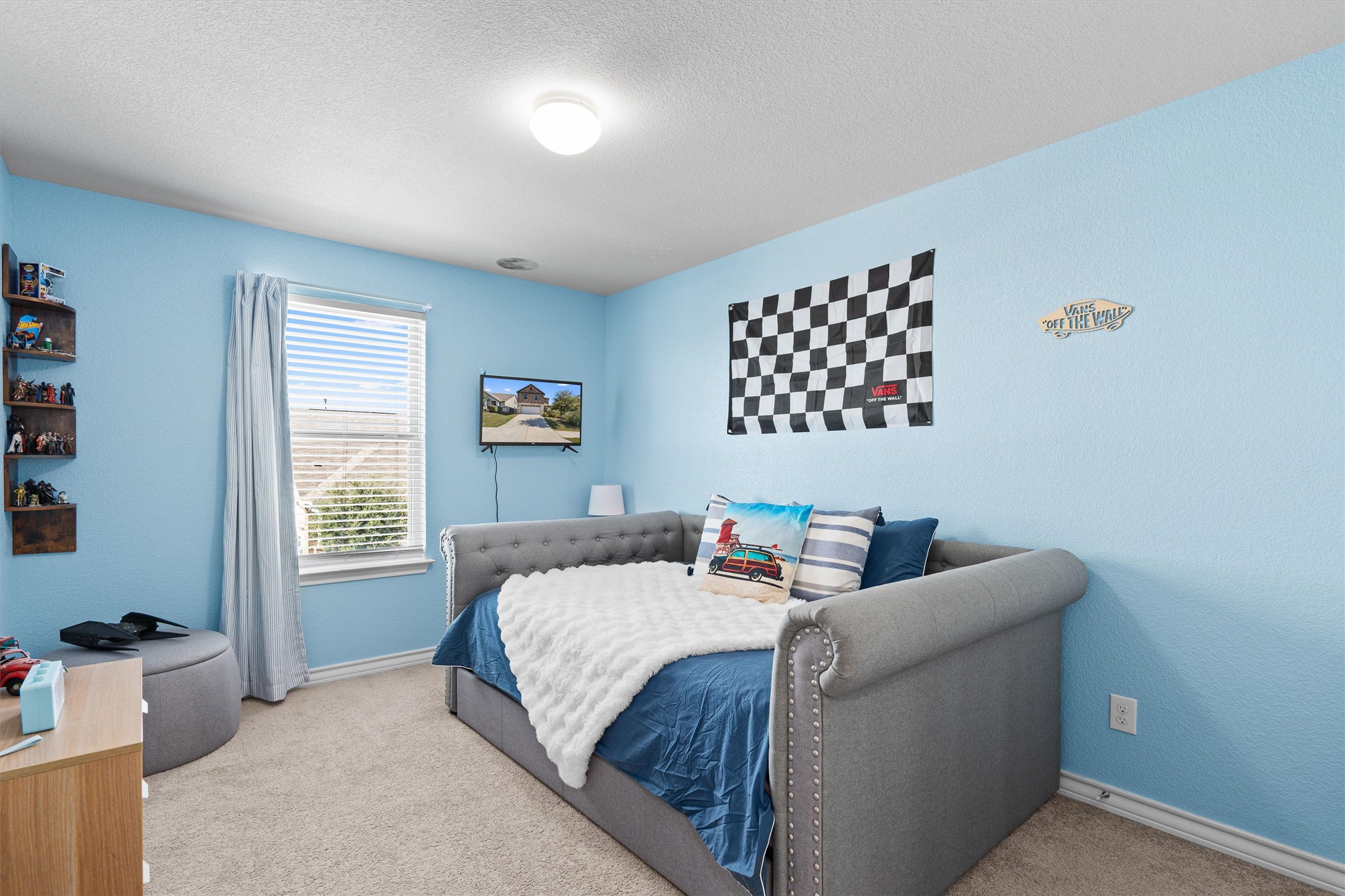 Undisclosed Address Buda, TX 78610 - Photo 30 of 39 a living room with furniture and a window