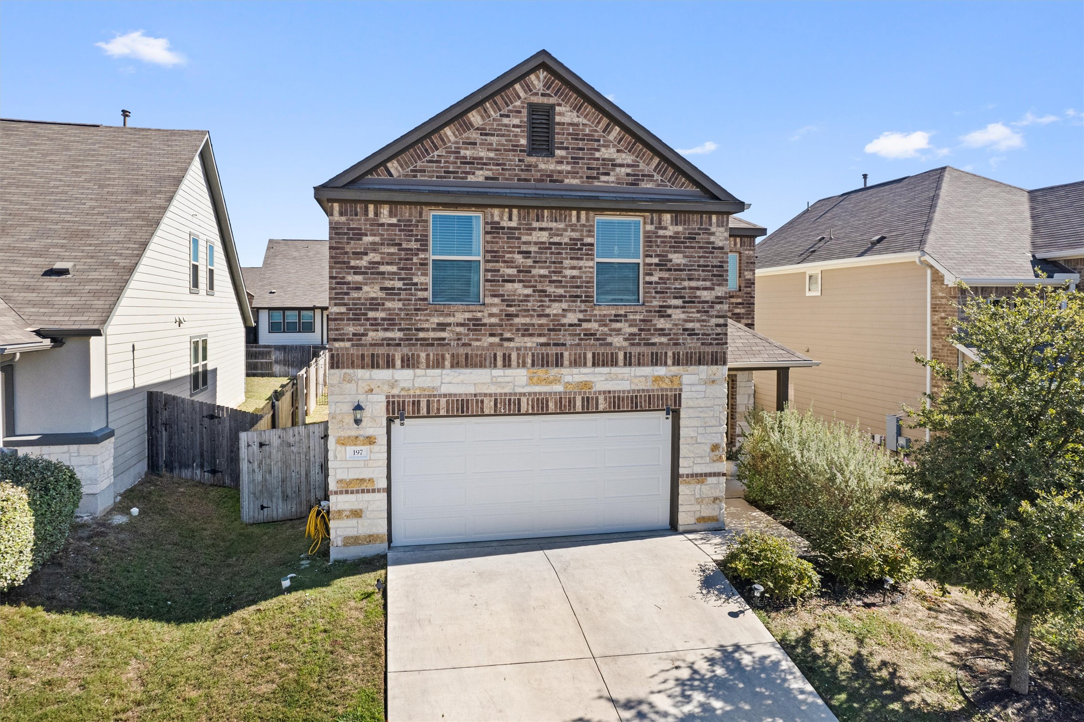 Undisclosed Address Buda, TX 78610 - Photo 3 of 39 a view of house with yard