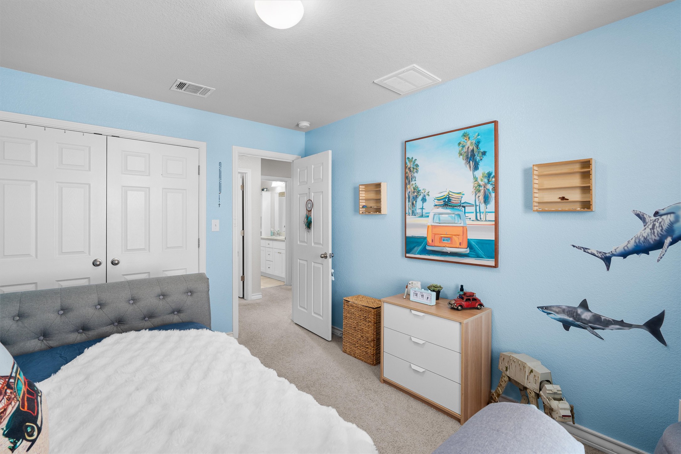 Undisclosed Address Buda, TX 78610 - Photo 31 of 39 a bedroom with a bed and furniture