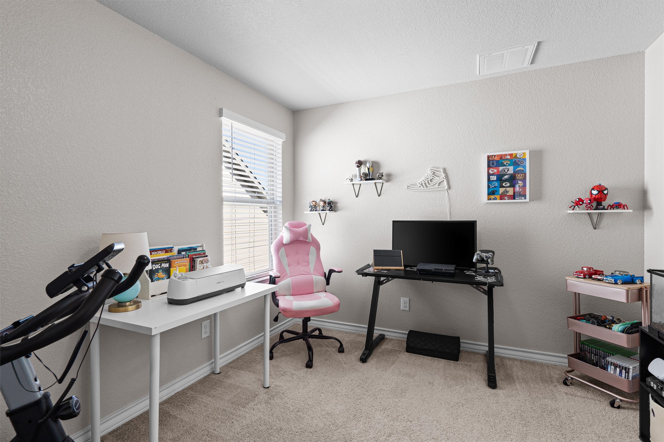 Undisclosed Address Buda, TX 78610 - Photo 32 of 39 a workspace with furniture and a window