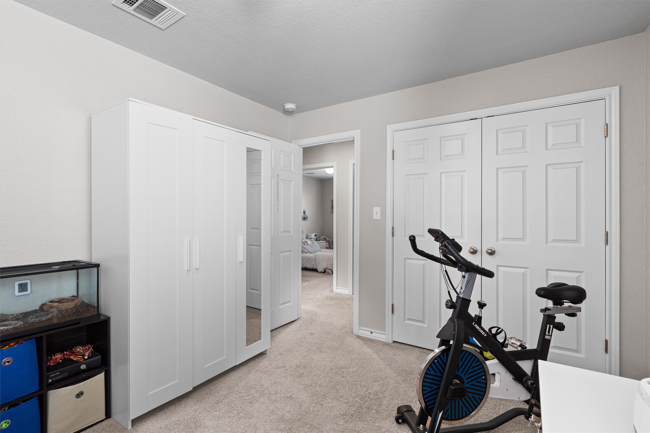 Undisclosed Address Buda, TX 78610 - Photo 33 of 39 a view of a room with gym equipment