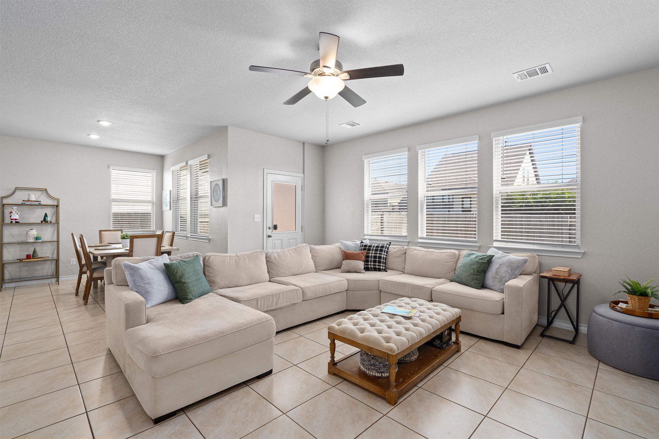 Undisclosed Address Buda, TX 78610 - Photo 7 of 39 a living room with furniture and a large window