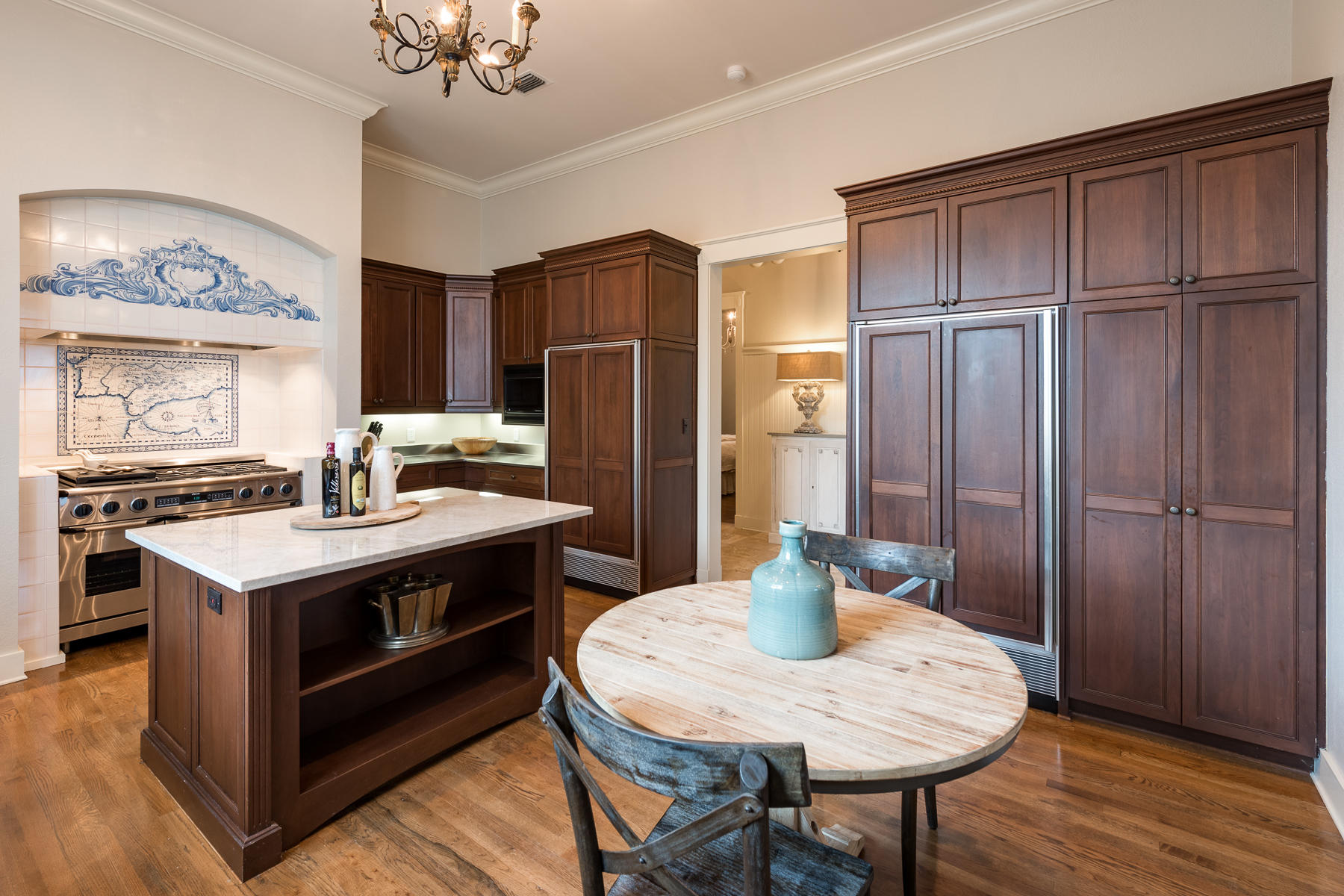 25 Stallworth Boulevard Santa Rosa Beach, FL 32459 - Photo 19 of 38 a kitchen with stainless steel appliances wooden floor dining table and chairs