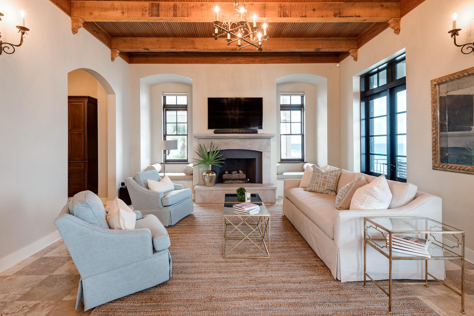 25 Stallworth Boulevard Santa Rosa Beach, FL 32459 - Photo 21 of 38 a living room with furniture a flat screen tv and a fireplace
