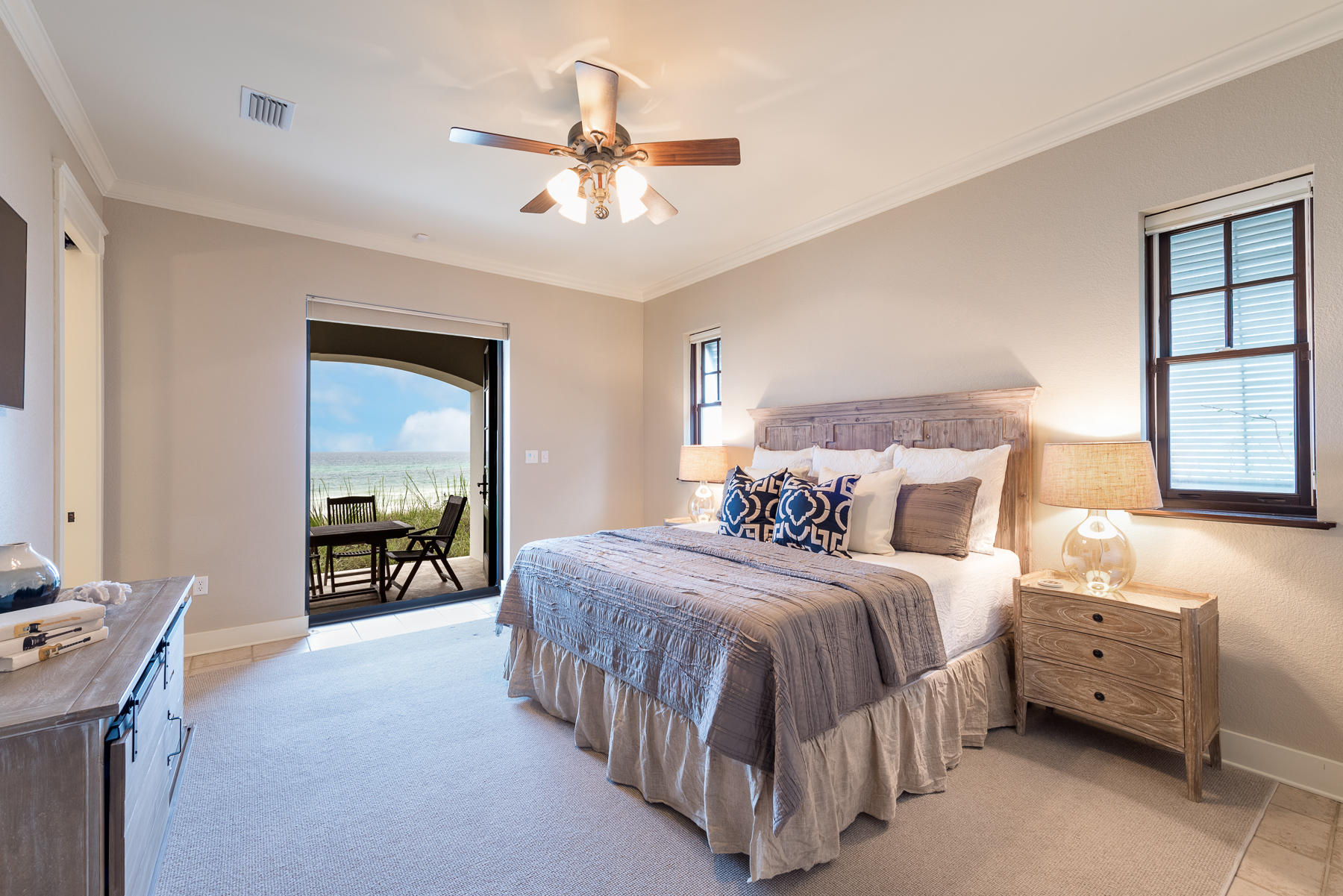 25 Stallworth Boulevard Santa Rosa Beach, FL 32459 - Photo 10 of 38 a bedroom with a bed and a chandelier
