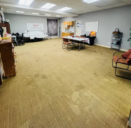 a living room with furniture and a table